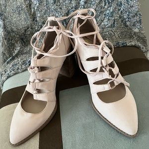 Tan shoe with lace up straps